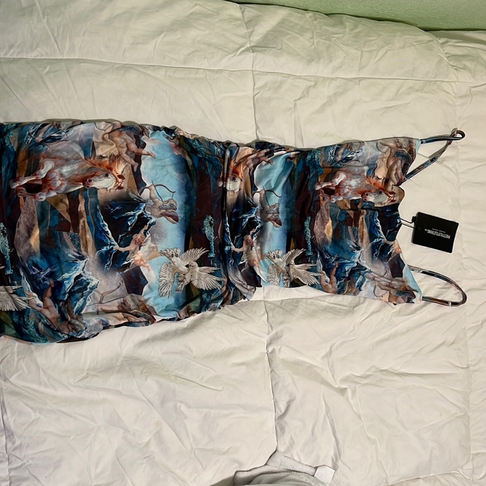 New strappy bodycon dress